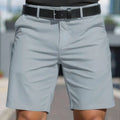 Men's solid colour straight-leg shorts in light grey micro-elastic polyester fabric.