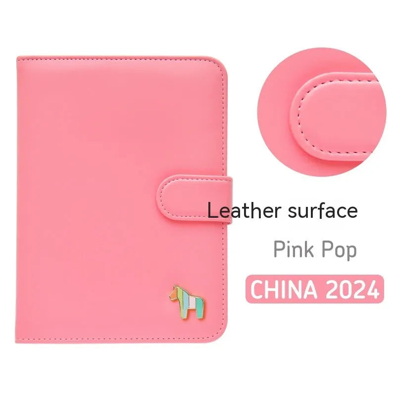Compact leather-covered 396-day schedule book for hand accounting, shown lying open flat.