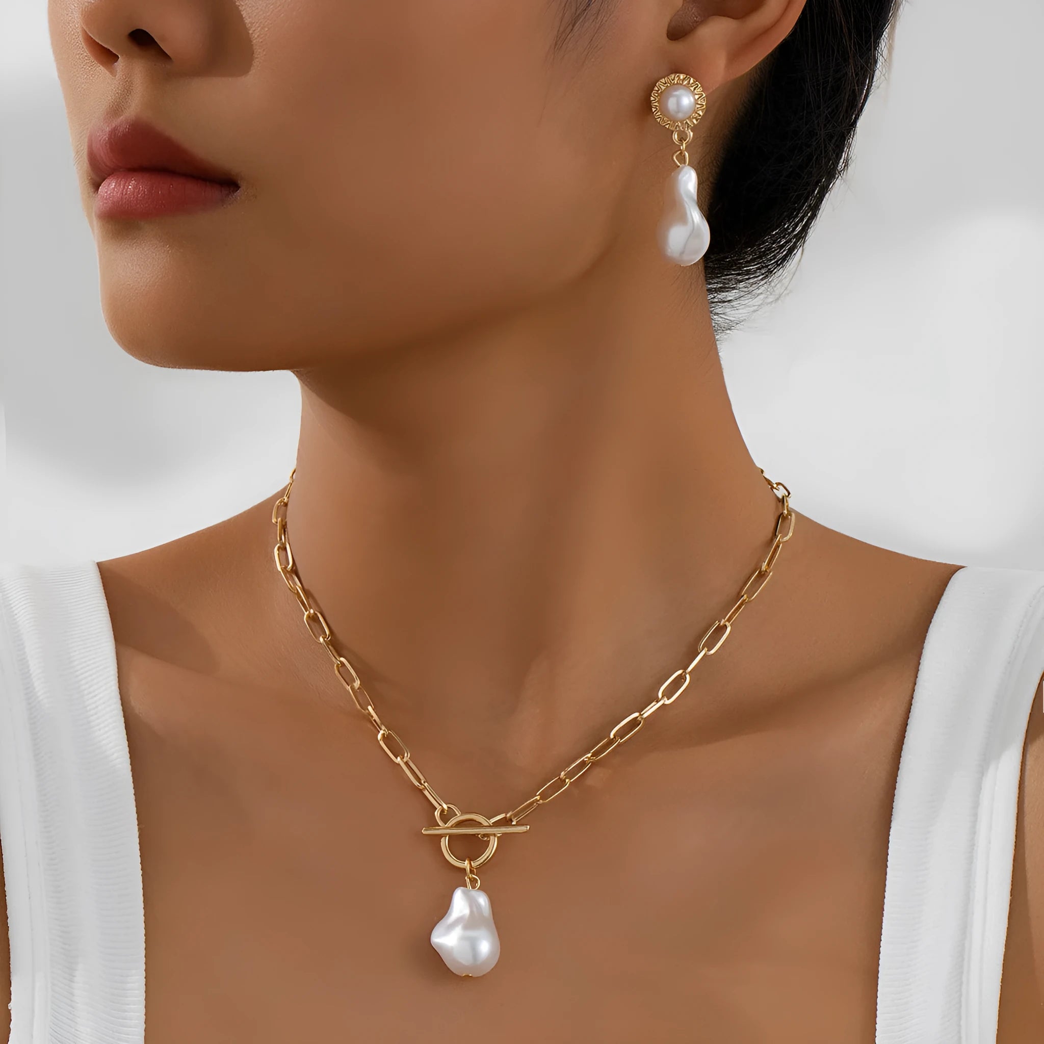 Gold baroque pearl pendant necklace and matching stud earrings jewellery set