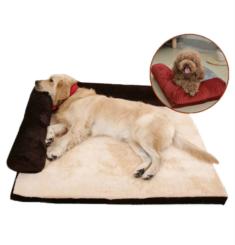 A corduroy dog sofa bed with raised sides, shown in a grey colour, placed on a wooden floor.