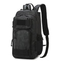 Orange and black outdoor backpack with 20-35 litre capacity for hiking and camping adventures