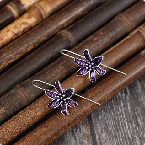 Purple flower-shaped alloy earrings with electroplated finish and butterfly clasps