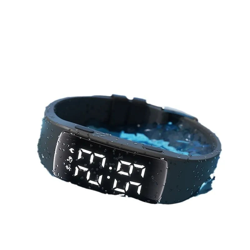 Smart waterproof electronic watch with vibration alarm on a silicone strap, showing an LED display.