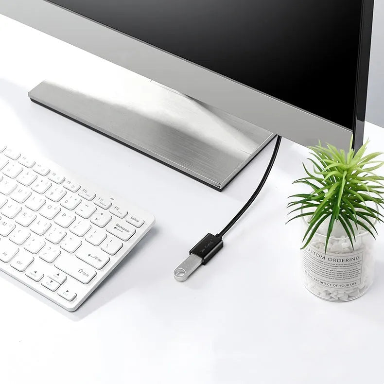 Black USB 3.0 and USB 2.0 male-to-female extension cable showing connector detail