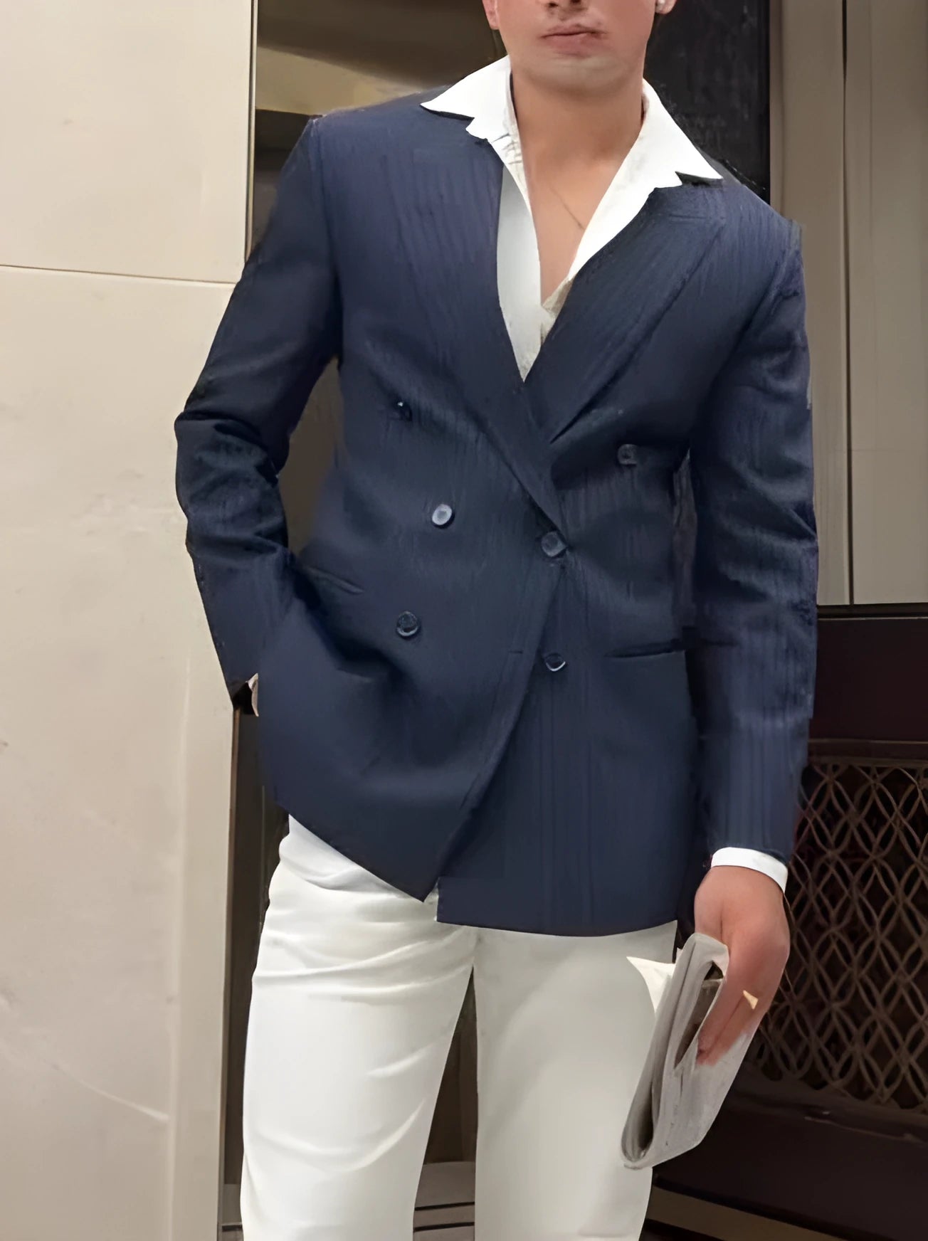 Men's classic striped double breasted blazer in regular fit on a hanger.