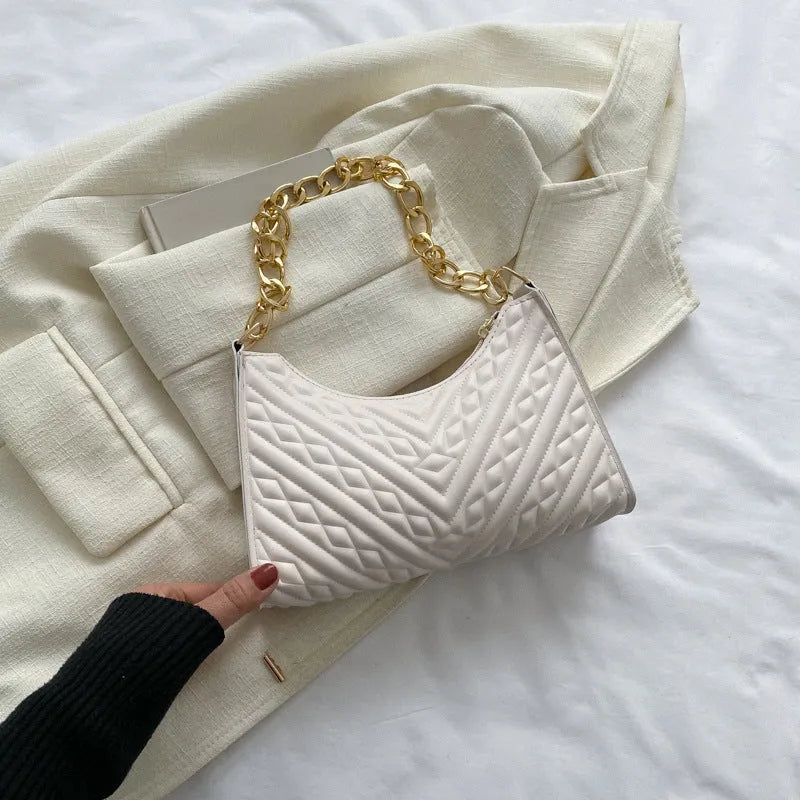 Black PU leather vertical square shoulder bag with chain strap, soft handle, and 3D outer pockets