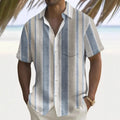 Man wearing a loose-fit printed casual shirt in a multi-colour design, cardigan style.