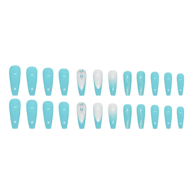 Long ballet artificial nails in smart blue diamond colour with glitter debris particles