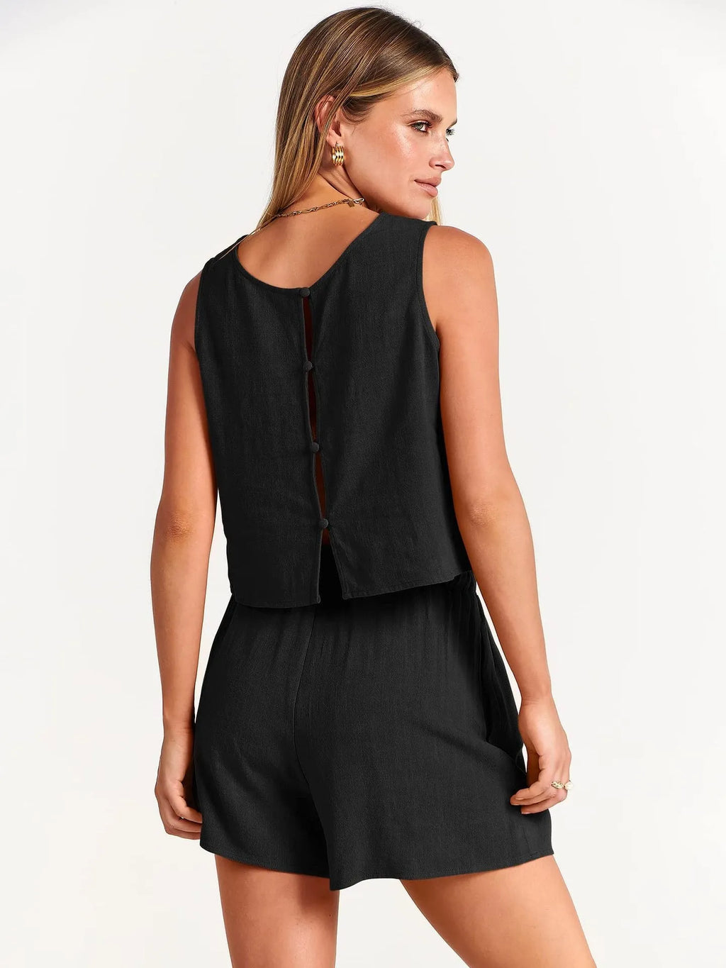 Women's sleeveless top and drawstring shorts co-ord set in a solid colour.