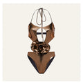 Gold halter neck one-piece swimsuit with hollow out design on mannequin