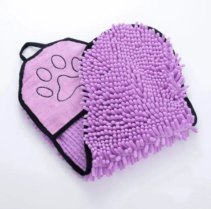 Blue pet bath robe towel wrapped around a small dog, showing its size and absorbent fabric.