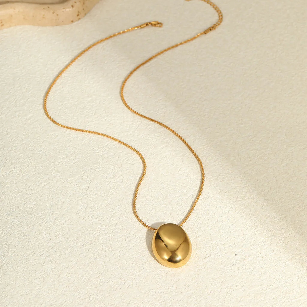 Gold geometric pendant necklace on adjustable 41-50cm chain with 18K plating
