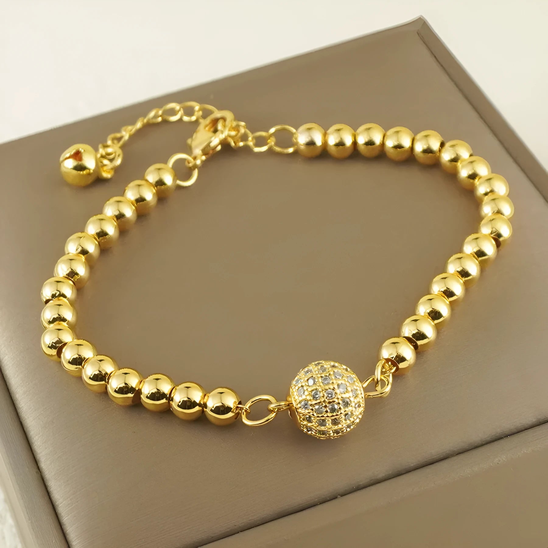 Women's copper bracelet with zircon stones in Arabic style featuring heart shape design
