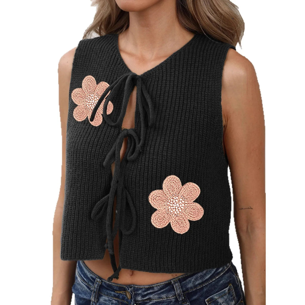 White women's lace-up vest top with bow tie and floral embroidery on sleeveless deer plush cardigan.
