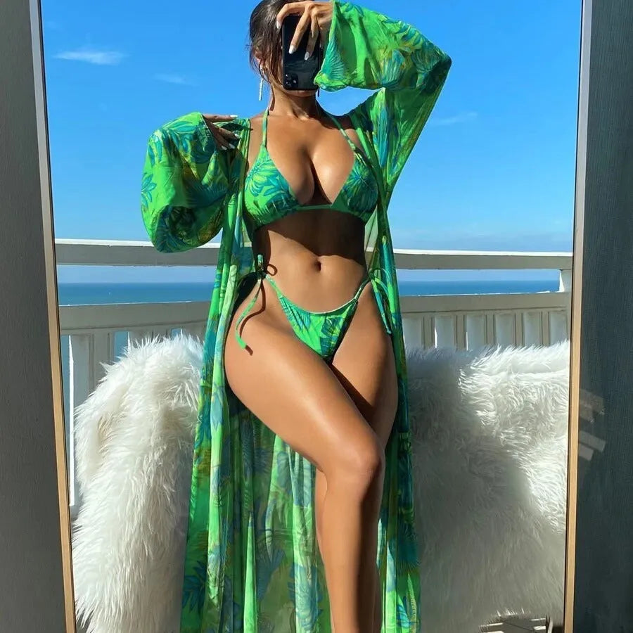 Women's long sleeve bikini set with banded briefs and matching outer robe in floral pattern