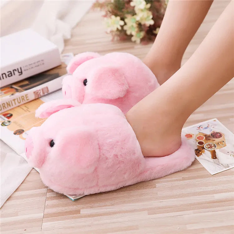Pink adult pig floor slippers with short plush fabric and PP cotton filling.