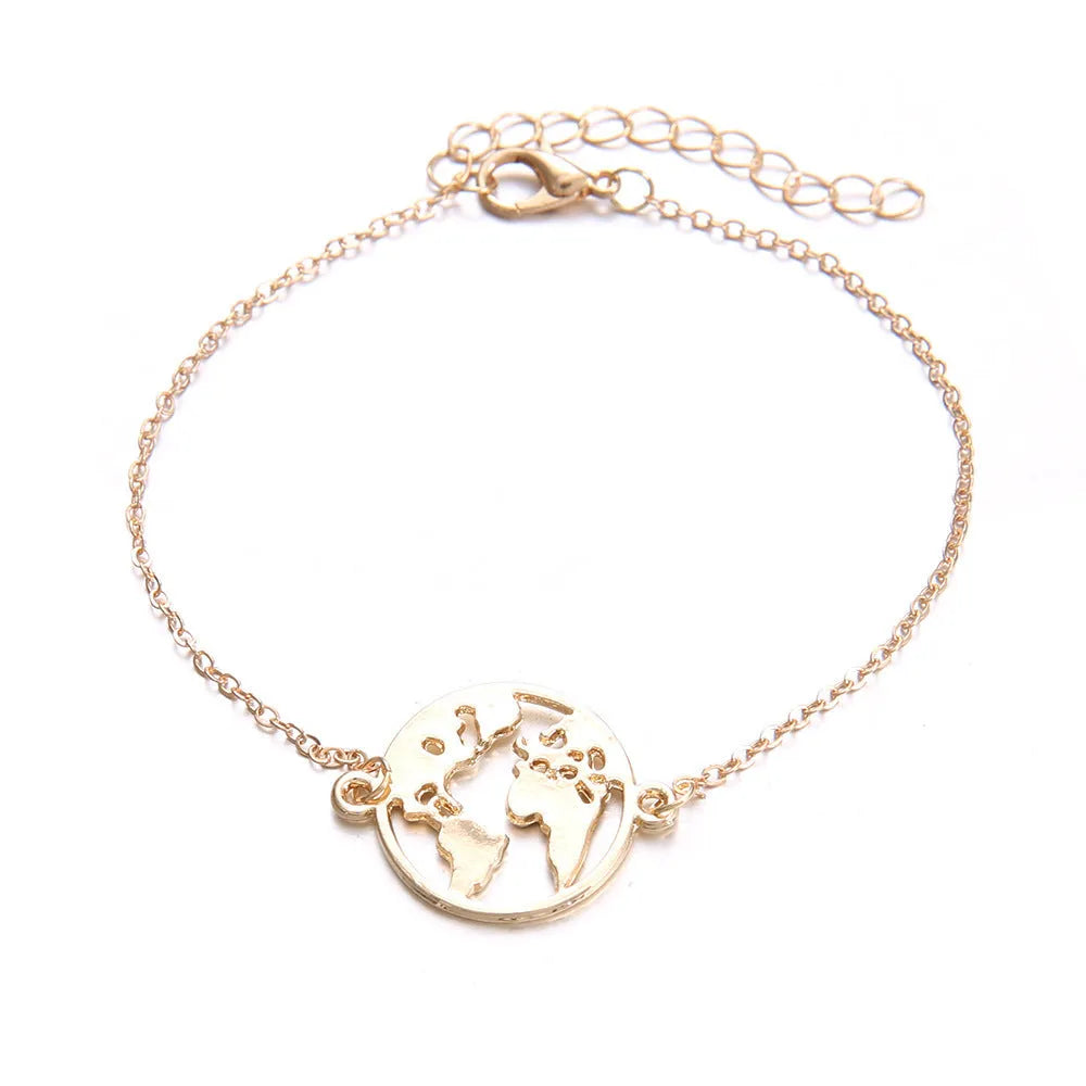 Three bohemian bracelets with heart-shaped aircraft map charms in silver tone