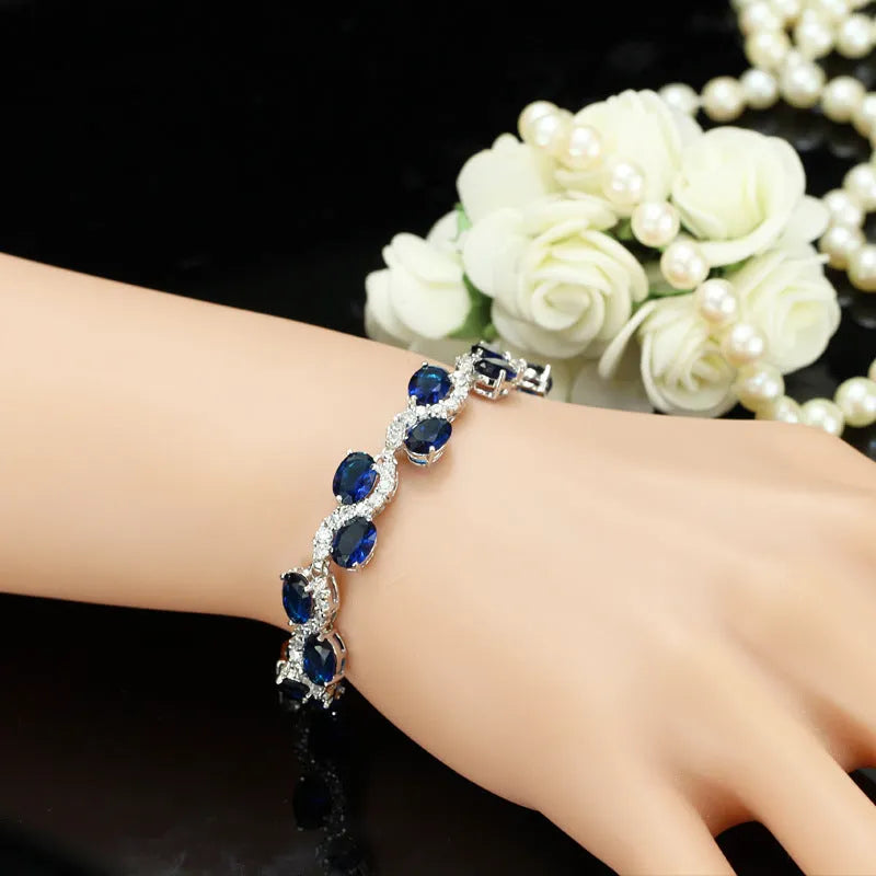 Copper-plated bracelet with AAA zircon stones in a geometric shape, showing real white gold colour finish.