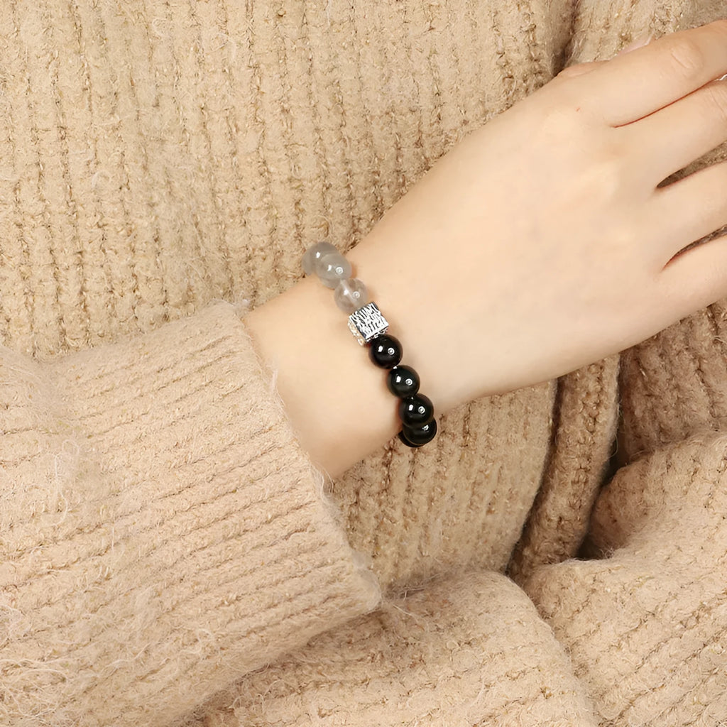 Khaki couple bracelet with Chinese geometric design in polished crystal, 10mm size.