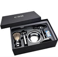 CSB men's shaving set with chrome safety razor, badger hair brush on stand, zinc bowl, and blades in black box.