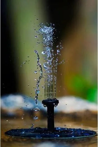 Black solar water fountain pump with four nozzle options for garden ponds and birdbaths