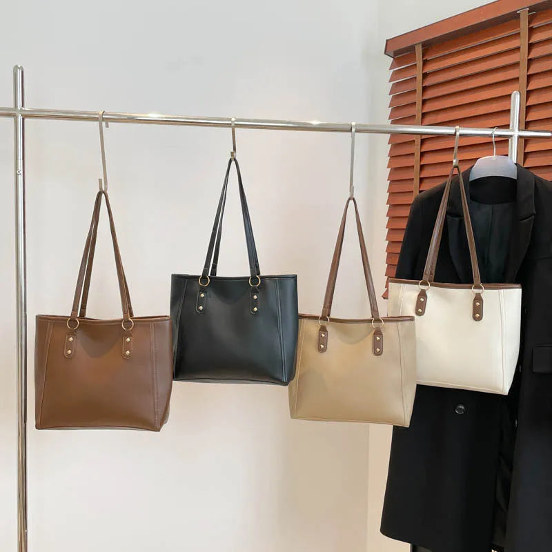 Korean-style black PU leather horizontal square shoulder underarm bag with an outer sandwich pocket.