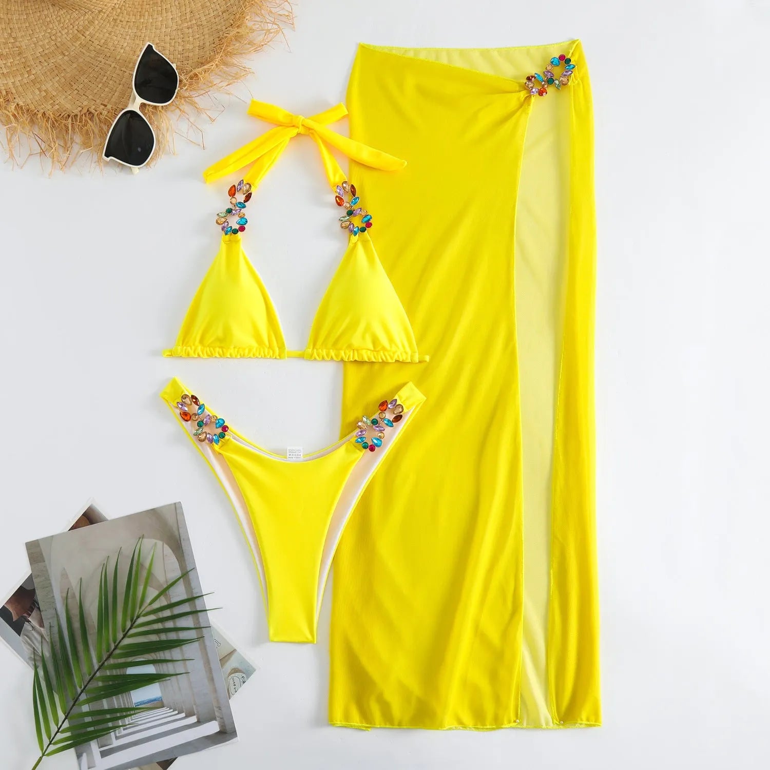 Rose red three-piece swimsuit set with bikini top, pants, and a long mesh skirt.