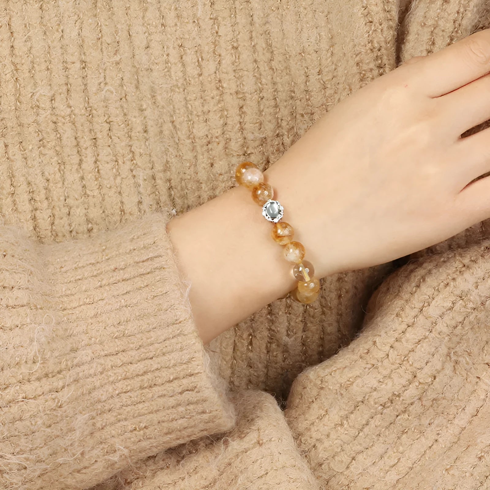 Citrine crystal bracelet with 10mm polished geometric beads on wrist