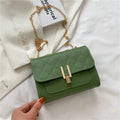 Women's minimalist crossbody bag with diamond lattice chain design in PU leather, showing adjustable strap and solid colour options