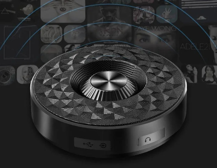 Compact Bluetooth portable speaker in black, orange or silvery white colours showing wireless connectivity