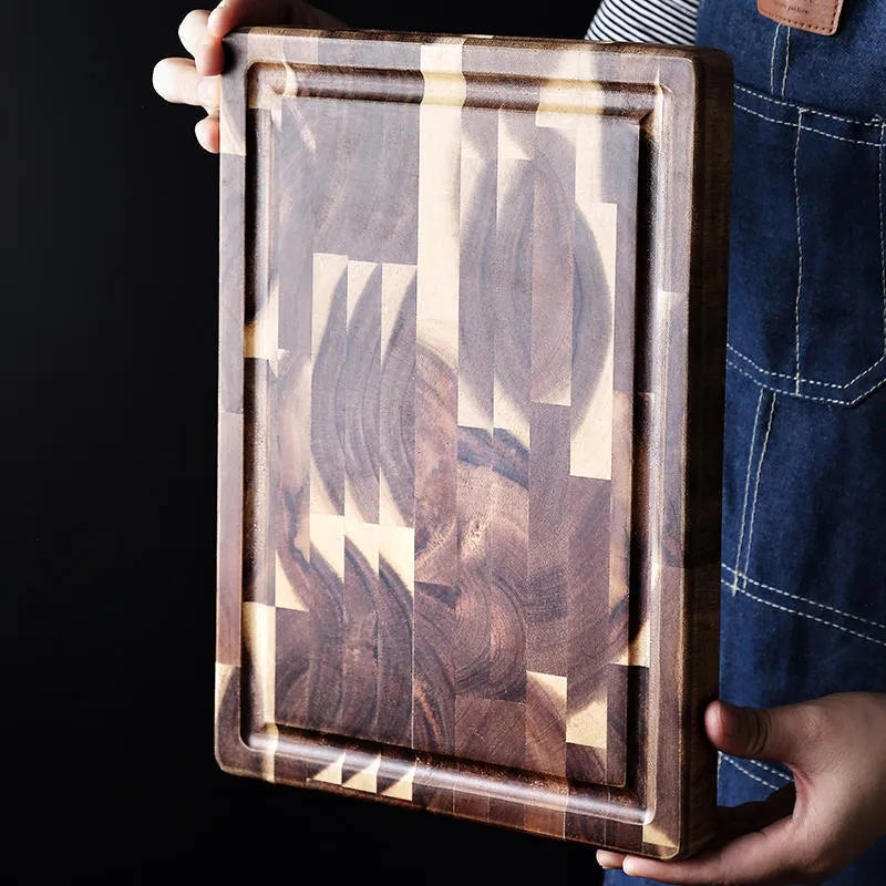 Brown solid acacia wood chopping board with 3cm thickness on a kitchen countertop