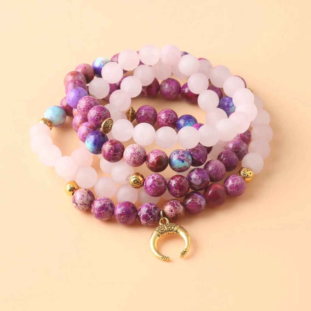 Round Emperor Stone necklace pendant with pink crystal detailing on chain