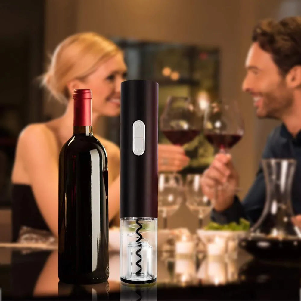 Black automatic electric wine bottle opener with integrated foil cutter on a countertop