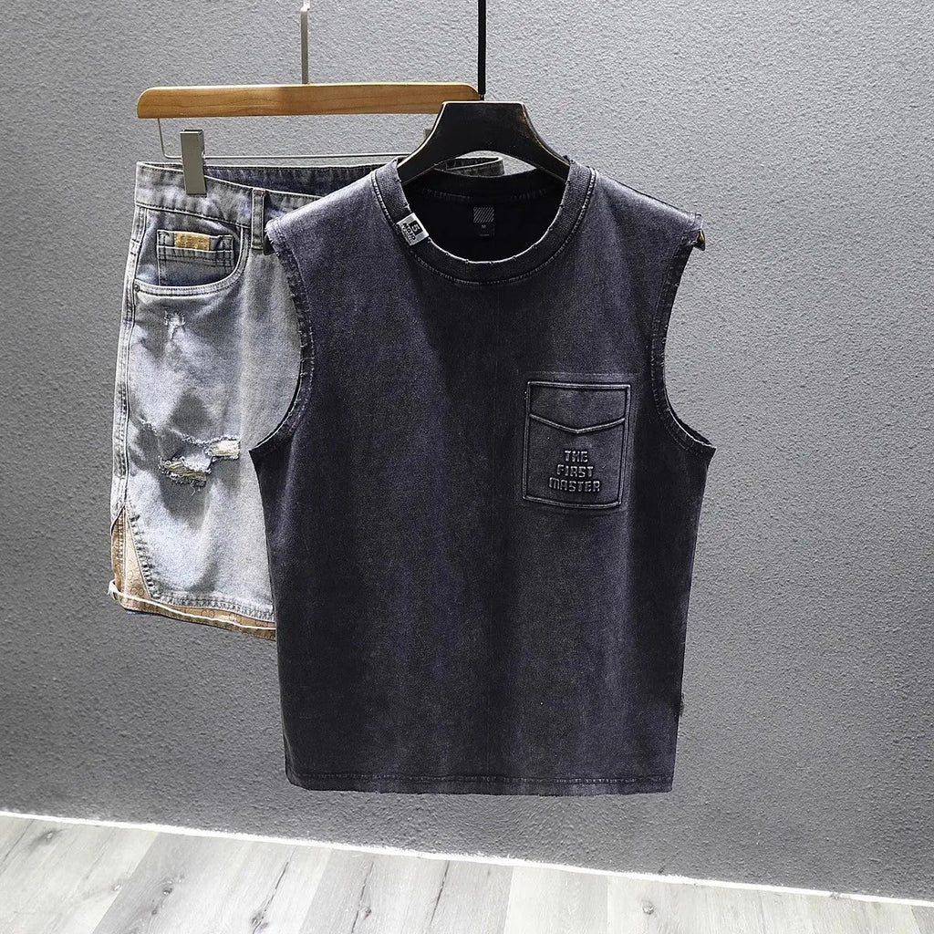 Solid colour loose cotton sleeveless t-shirt on a hanger in white or black