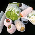 White foam protective net case for fruits showing mesh texture and size options