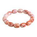 Natural cherry agate barrel bead bracelet with Ruyi pattern measuring 10x14mm