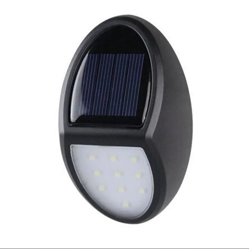Black solar-powered LED wall light with solar panel and motion sensor