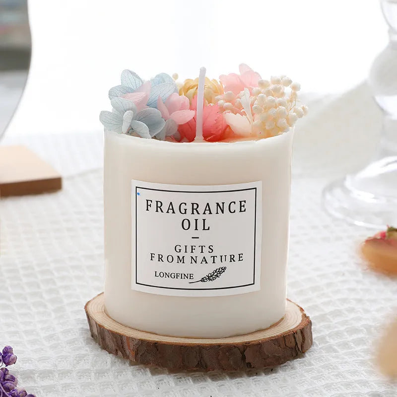 330g aromatherapy candle with embedded dried flowers, available in nine fragrances with optional gift box and wooden base