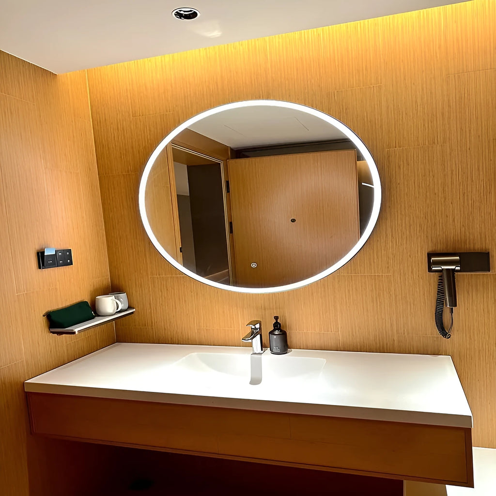 Round black framed wall-mounted LED smart bathroom mirror showing touch control and three light colours.