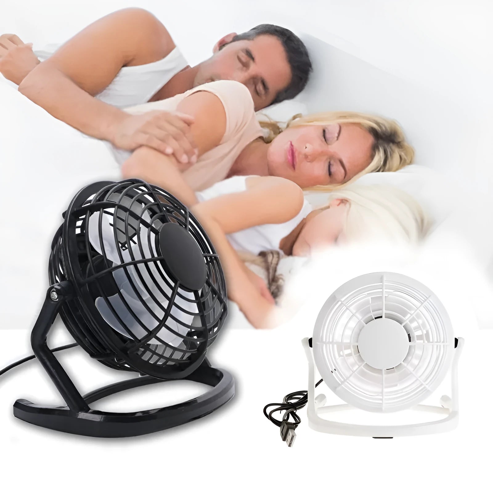 Compact black USB desk fan with adjustable tilt angle on a wooden desk next to a laptop