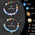 Set of two natural stone beaded bracelets showcasing zodiac sign charms on a white background.