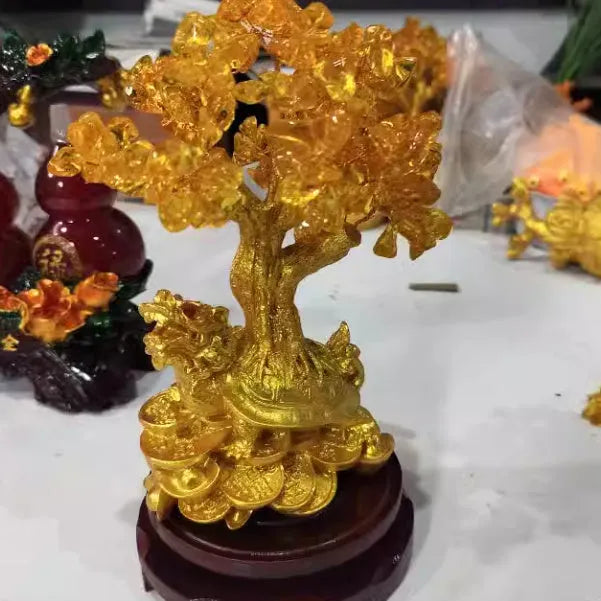 Citrine-coloured resin Feng Shui ornament with small water turtle and money tree design measuring 18x11x23cm