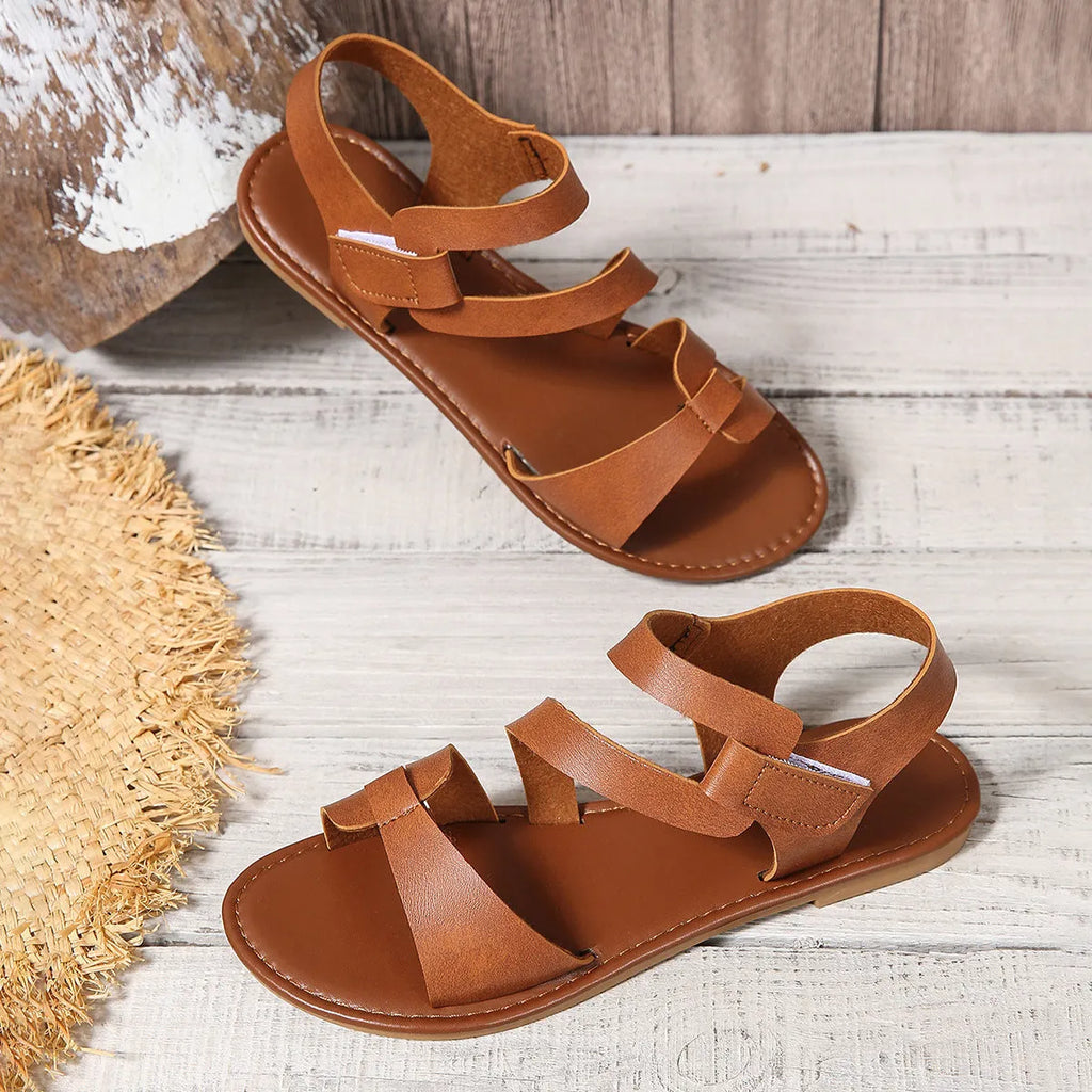 Women's flat sandals with Velcro strap closure in round toe design