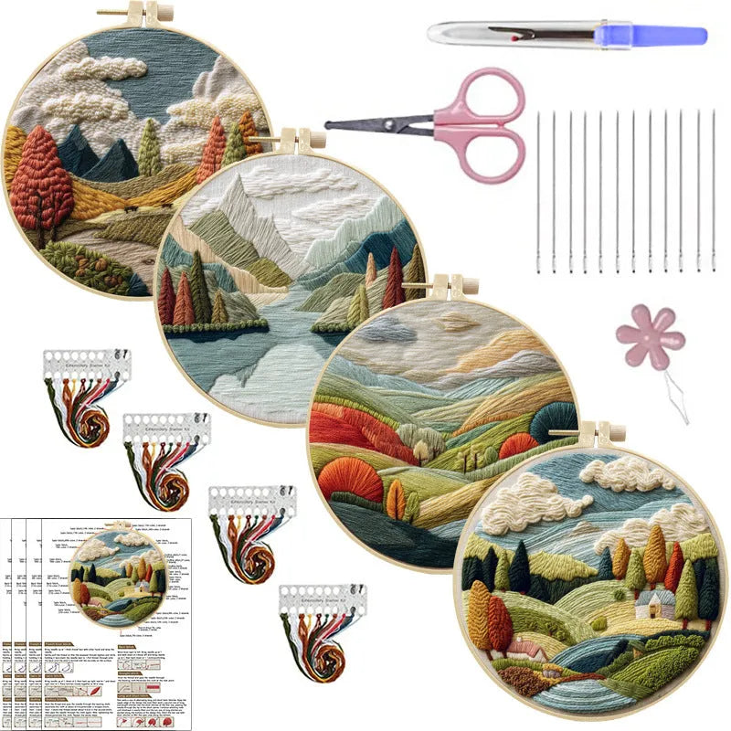 Landscape embroidery DIY kit with cotton fabric, printed pattern, embroidery frame, needles, and thread on wooden surface