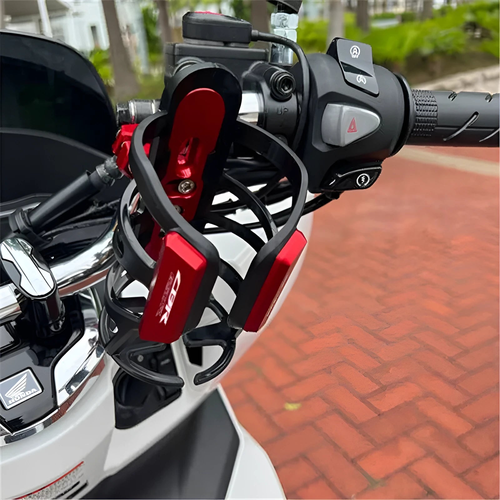 Aluminium water bottle cage for Honda X-ADV750 and XADV150 scooters in six colour options