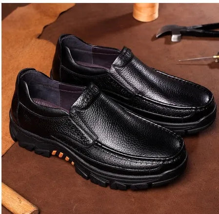 Men's black leather slip-on business casual shoes with a rubber sole.