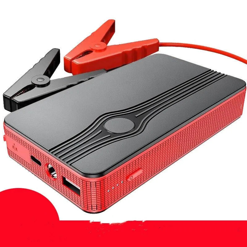Red K4-E automotive emergency jump starter and power bank unit with USB cable
