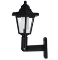 Black hexagonal solar wall lamp with LED illumination for outdoor garden lighting