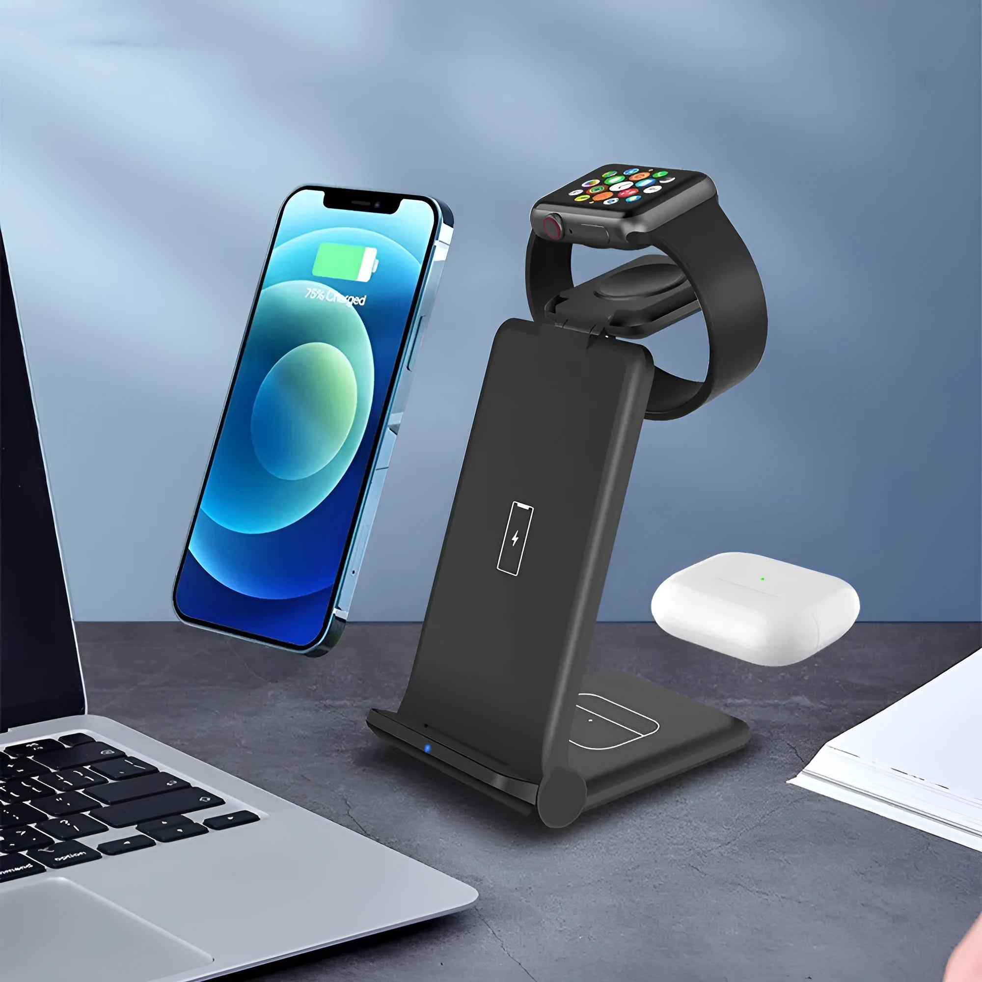 Black and white 3-in-1 wireless charging station for phone, AirPods and Apple Watch on a desk.