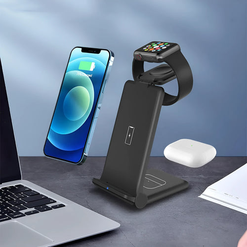 Black and white 3-in-1 wireless charging station for phone, AirPods and Apple Watch on a desk.
